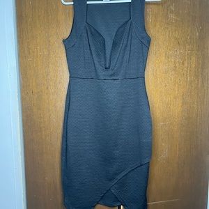 Deep cut little black dress